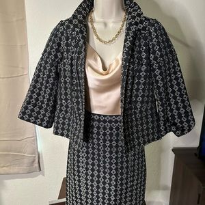UNIQUE Skirt suit, Black and white patter. Stand out from the crowd.